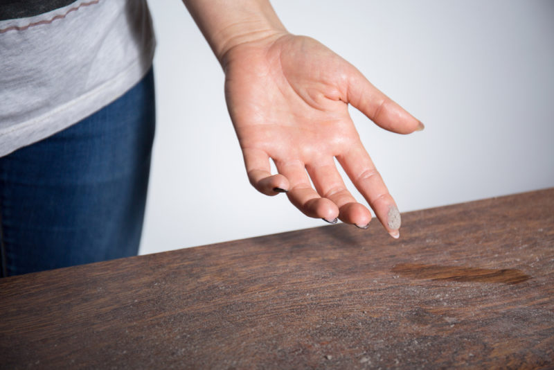 COMFORT dust on woman finger shutterstock  e