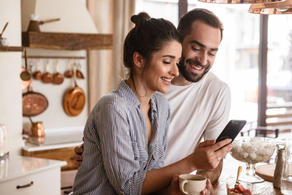 happy couple on phone