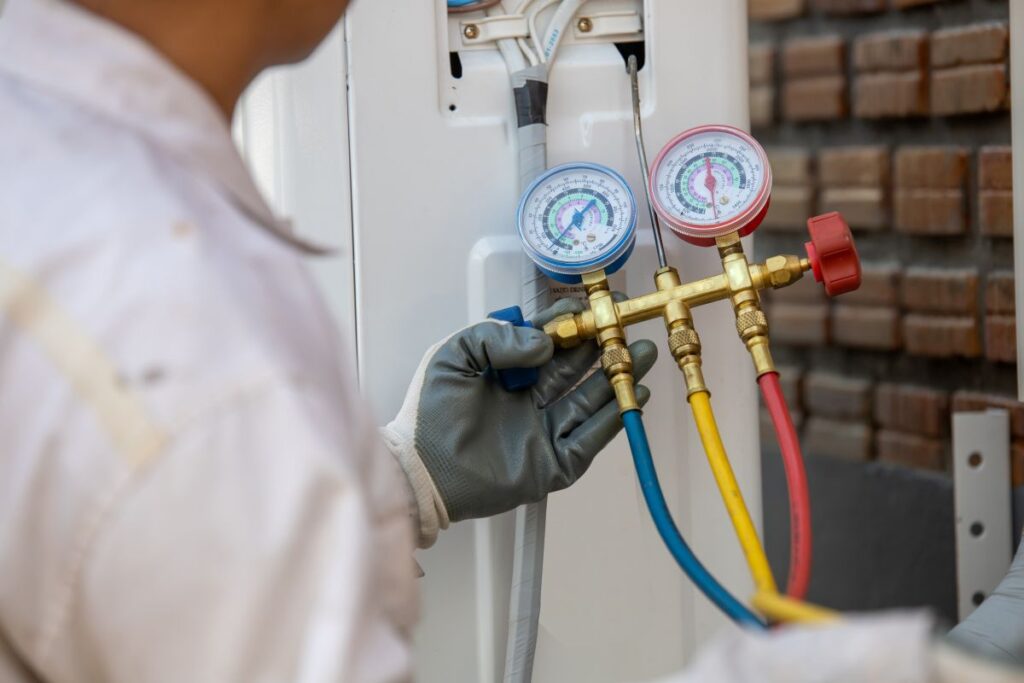 Air Conditioning Technician and A part of preparing to install new air conditioner.